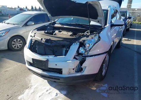 2014 Cadillac Srx Luxury Collection z USA, uszkodzony, nr VIN 3GYFNBE35ES658045